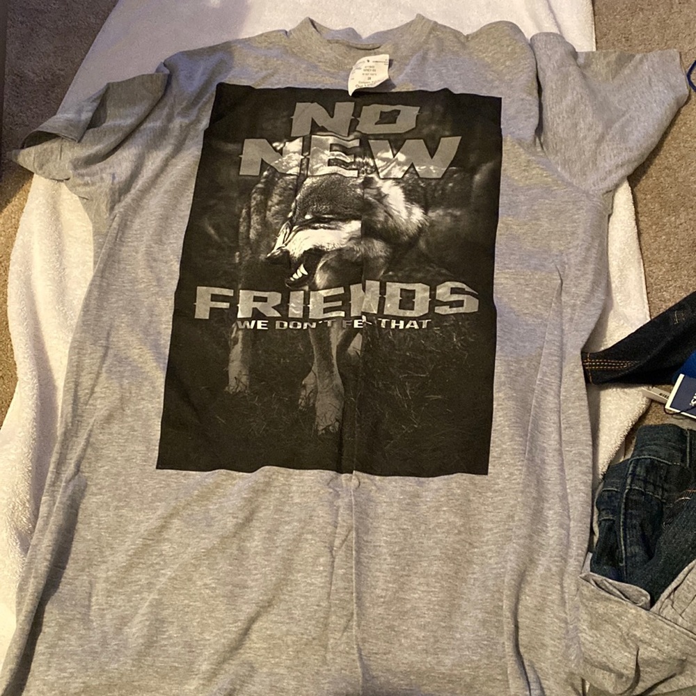 Selling a grey graphic T-shirt that was never worn!